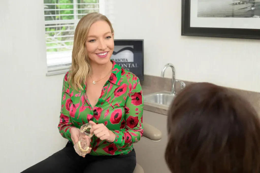 Periodontist with patient at Sarasota Periodontal Associates