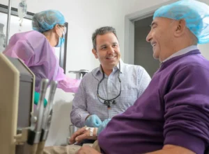 Periodontist with patient at Sarasota Periodontal Associates