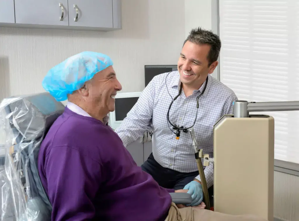 Periodontist with patient at Sarasota Periodontal Associates